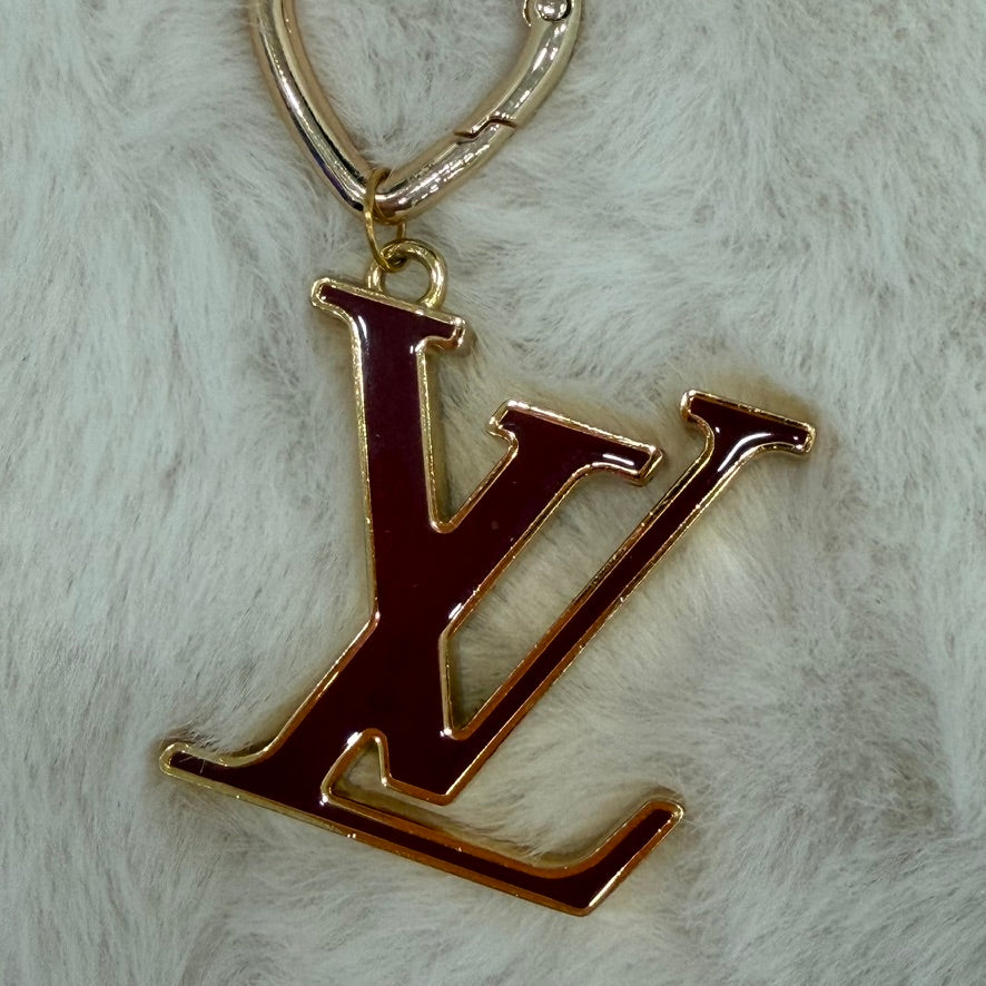 Louis Vuitton Facette Bag Charm with unbranded pearl chain