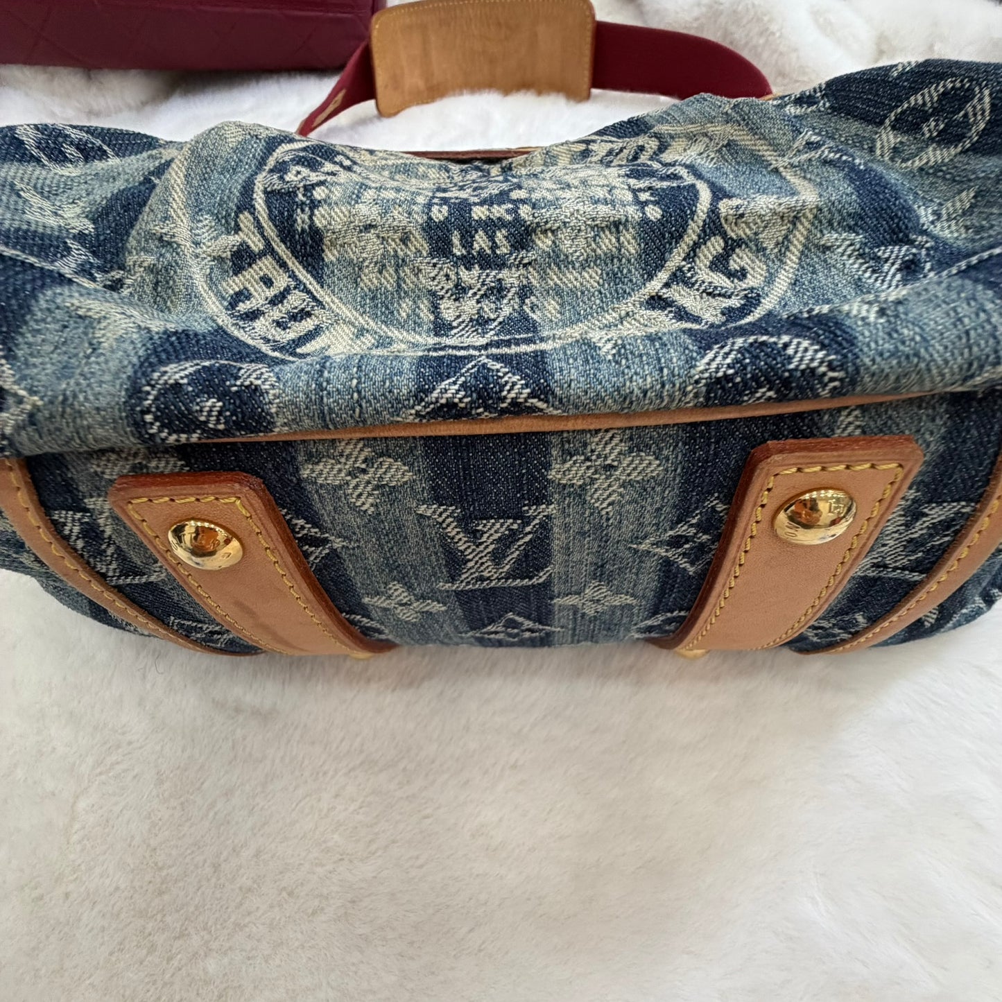 Louis Vuitton Denim Raye Porte Epaule MM shoulder/crossbody bag.