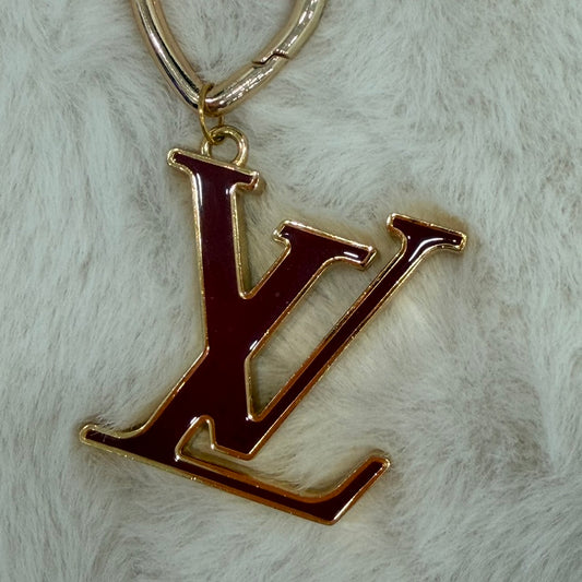Louis Vuitton Facette Bag Charm with unbranded pearl chain