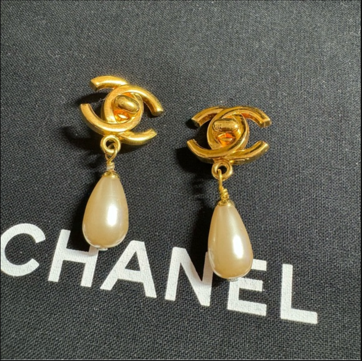 Authentic CHANEL turn lock CC logo with faux pearl dangle earrings