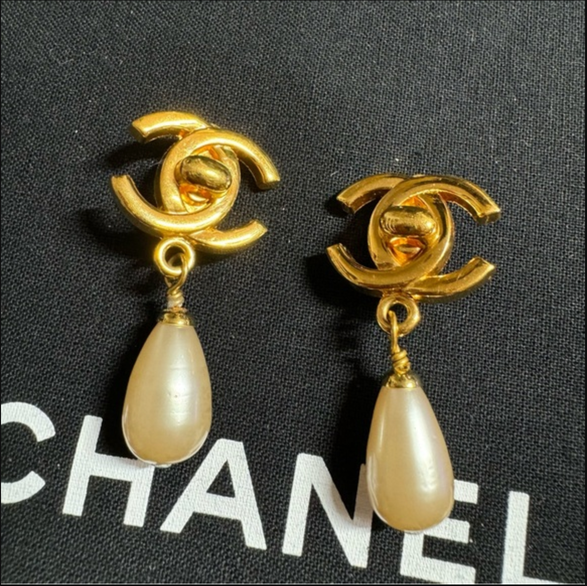 Authentic CHANEL turn lock CC logo with faux pearl dangle earrings