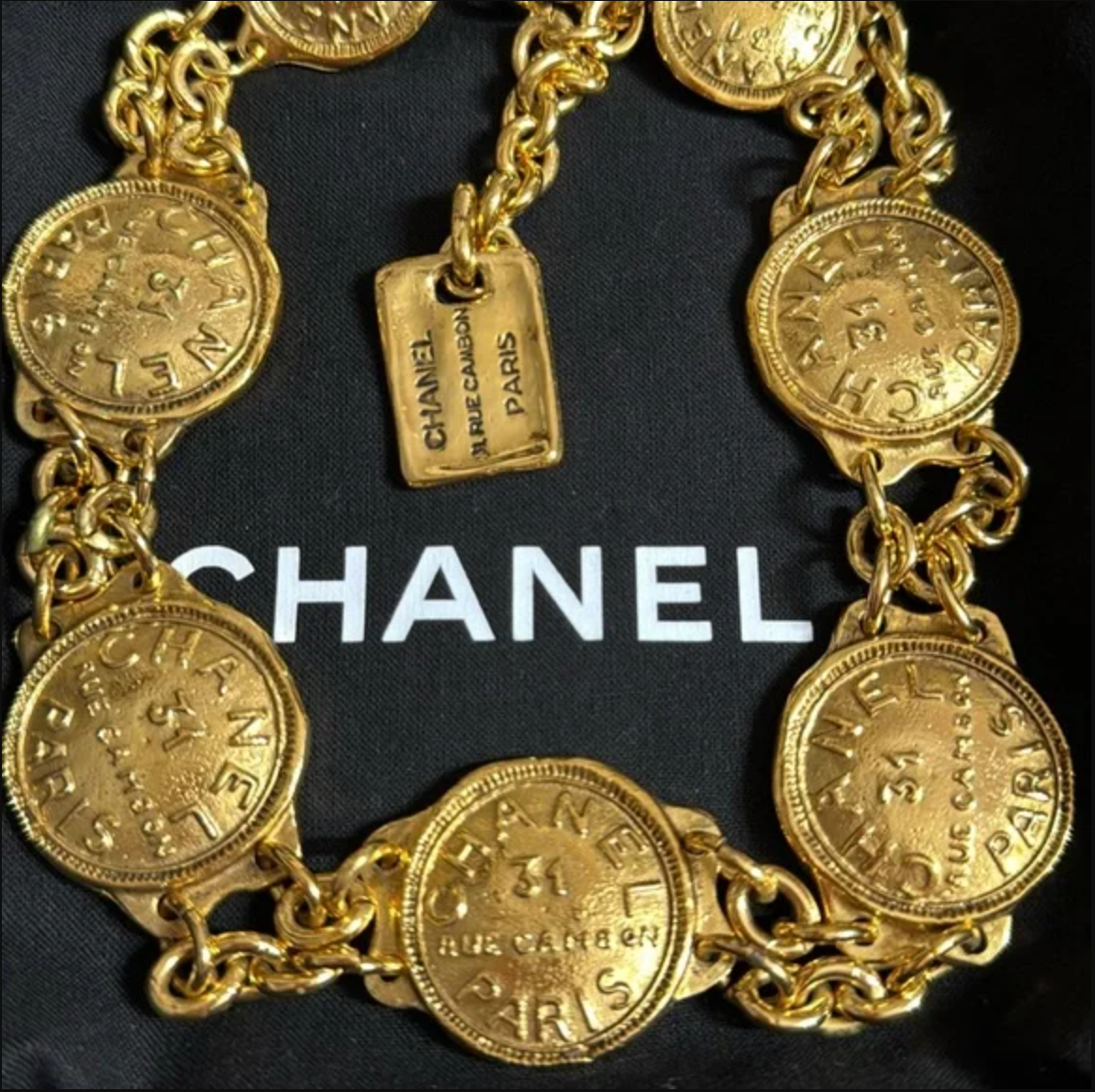 Authentic CHANEL gold toned medallion and Link chain necklace