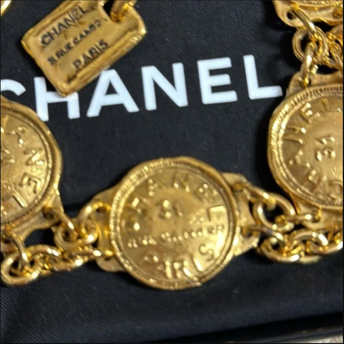 Authentic CHANEL gold toned medallion and Link chain necklace