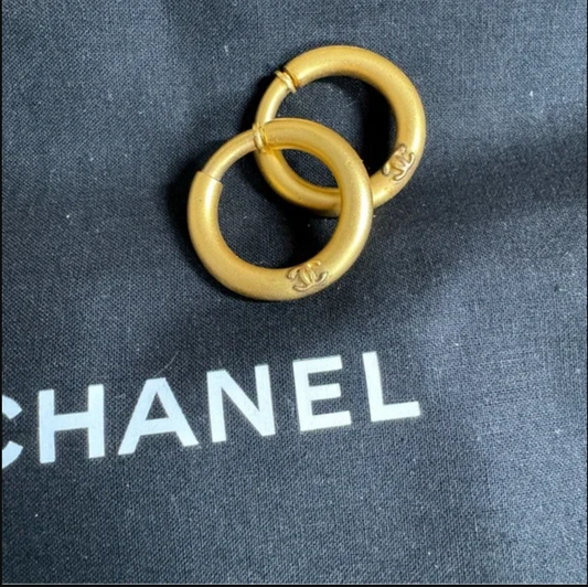 Authentic CHANEL gold toned hoop clip on earrings