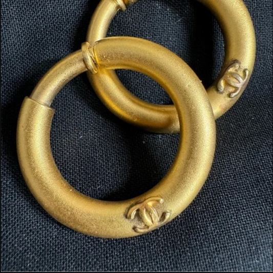 Authentic CHANEL gold toned hoop clip on earrings