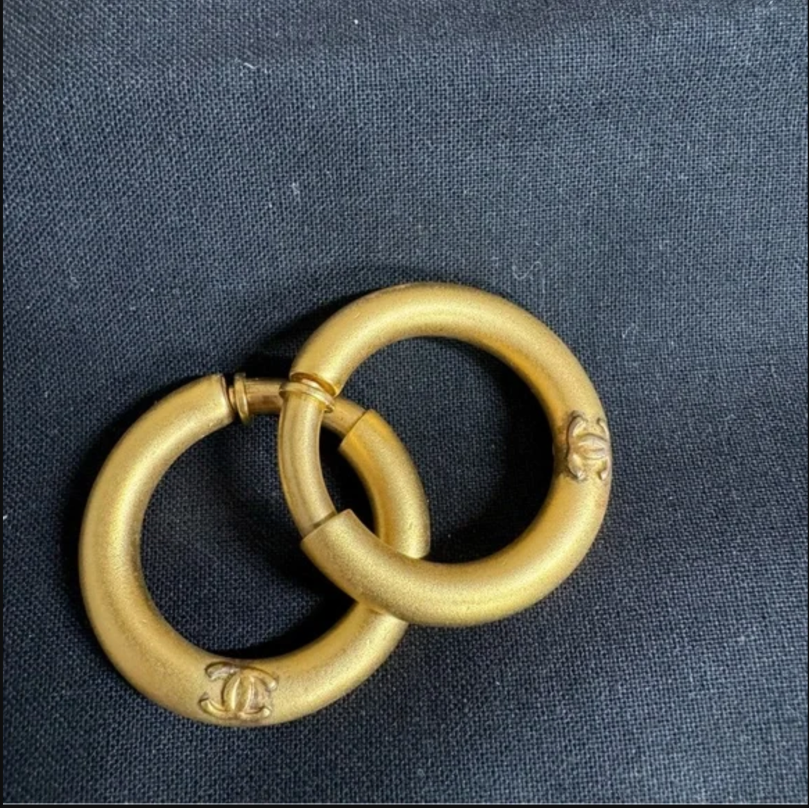 Authentic CHANEL gold toned hoop clip on earrings