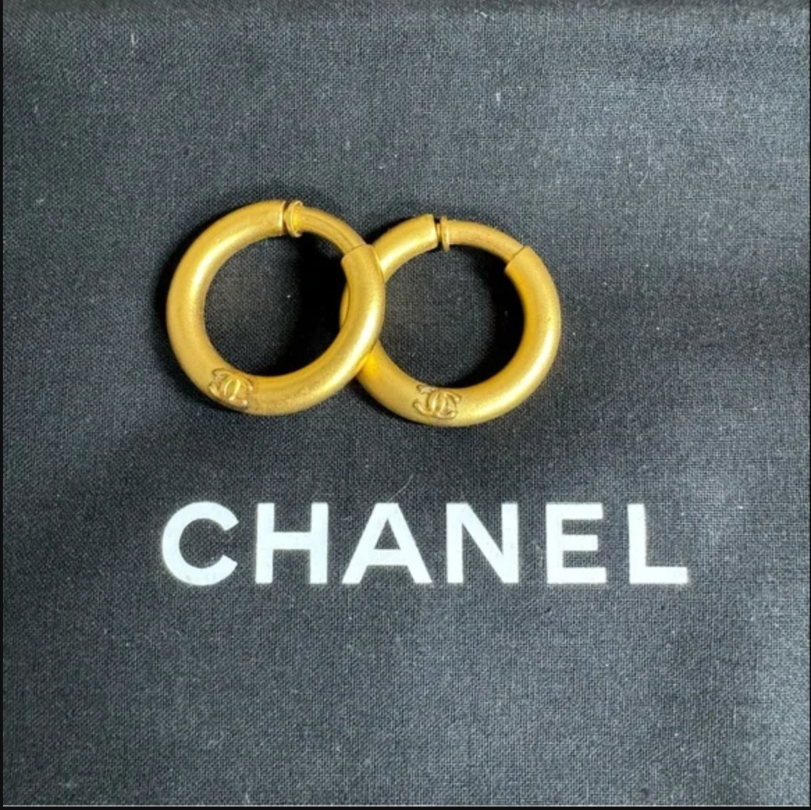 Authentic CHANEL gold toned hoop clip on earrings