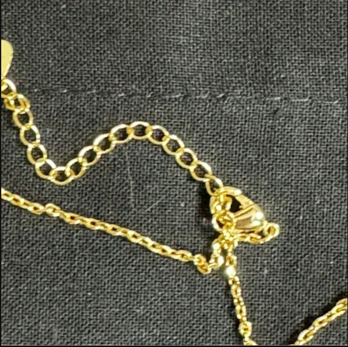 Authentic CHANEL gold toned perfume necklace