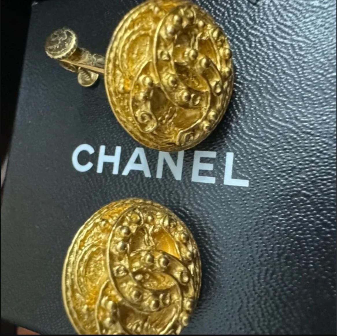 CHANEL EARRINGS. Gold toned clip-ons