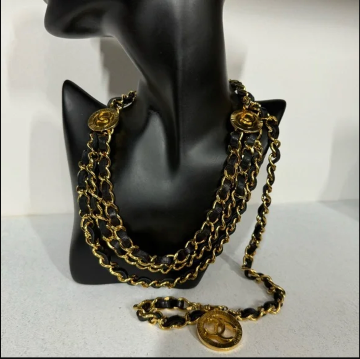 Authentic CHANEL gold toned and black leather necklace / belt.