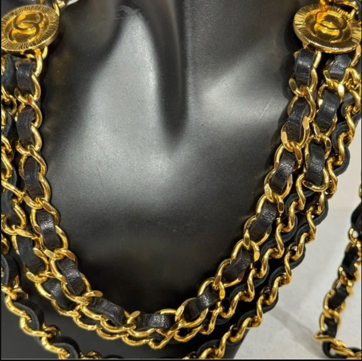 Authentic CHANEL gold toned and black leather necklace / belt.