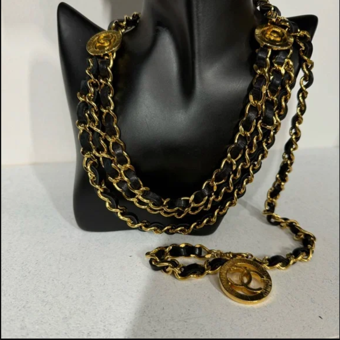 Authentic CHANEL gold toned and black leather necklace / belt.