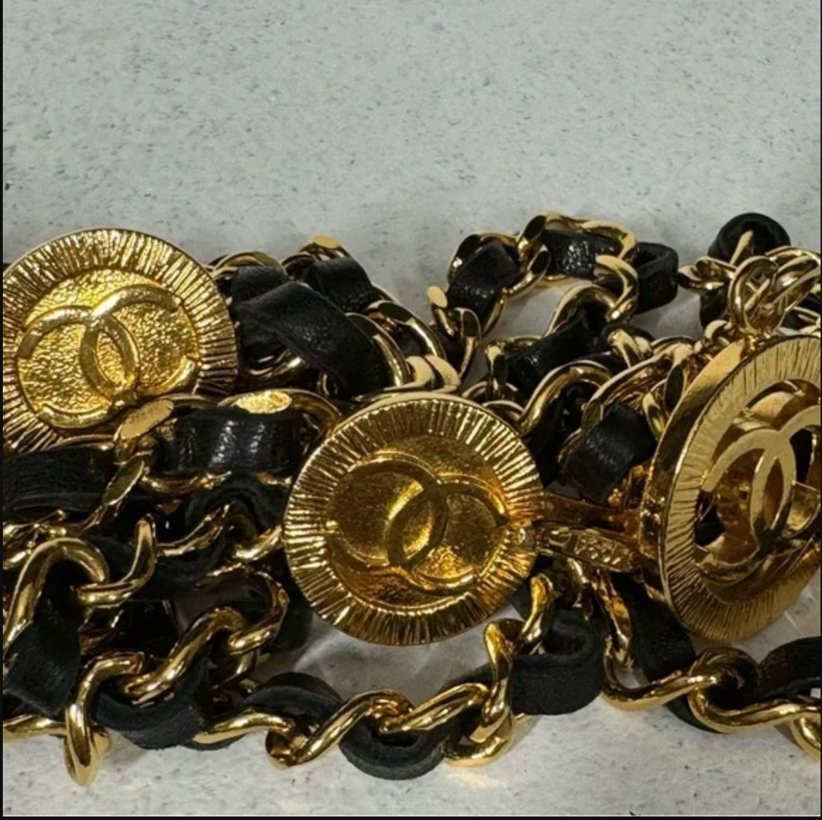 Authentic CHANEL gold toned and black leather necklace / belt.