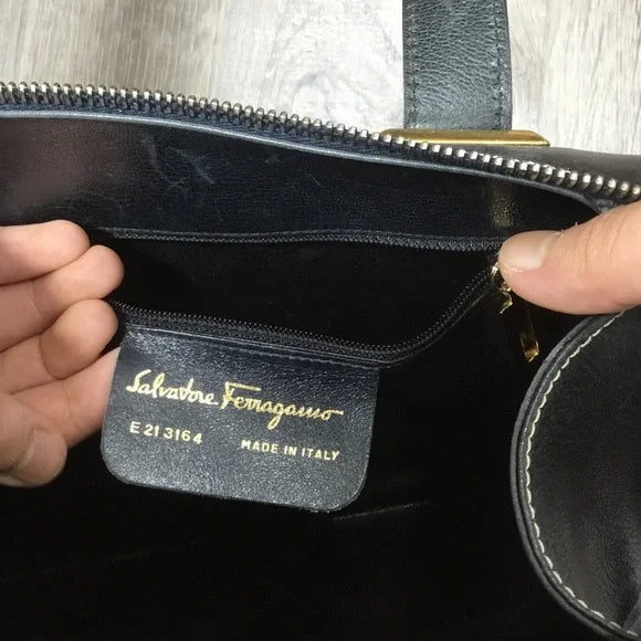 Salvatore Ferragamo Black Satchel with Gold Accents